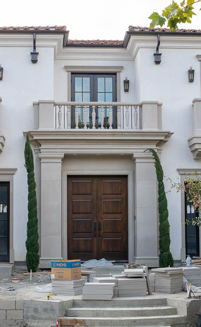 view from street of front door with custom concrete precast on transitional contemporary project in Ladera Ranch