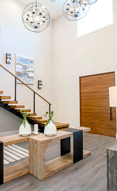 inside view of mahogany door and staircase in San Juan Capistrano Italian Beach