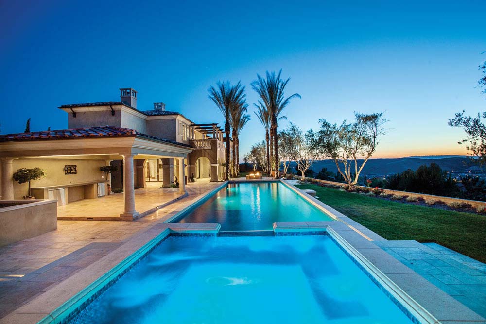 poolside view of backyard in Italian revival project #2 in Ladera Ranch